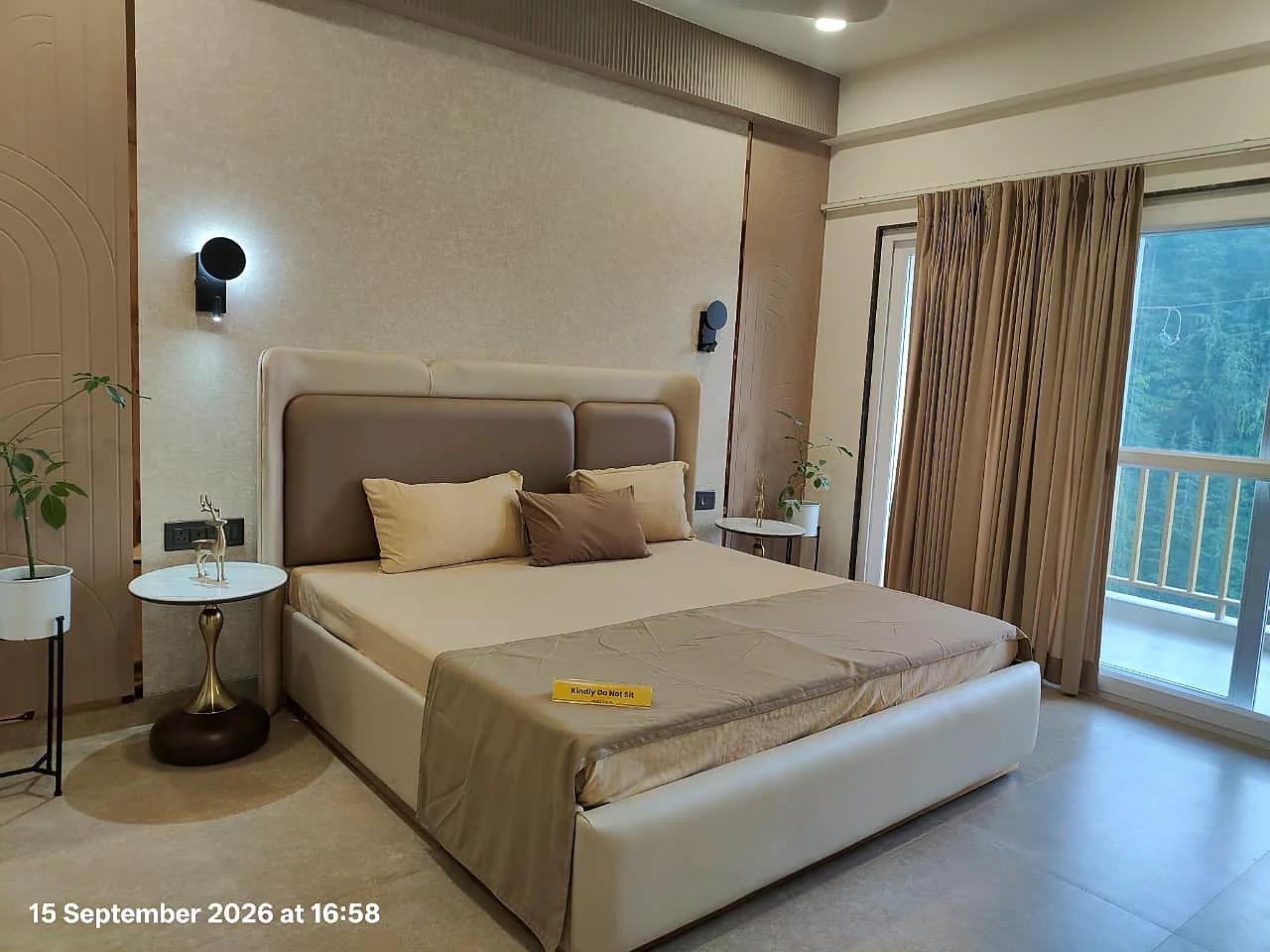 Tara Devi's Enclave Shimla bedroom with balcony and forest view